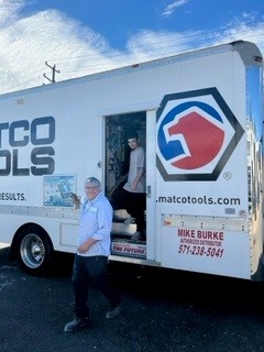Alex and shop owner, Kris Burton, exiting the Matco Tools truck, a supplier of tools used in the Auto Body field. 