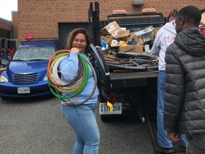 Students unload supplies donated by Corridon Electric