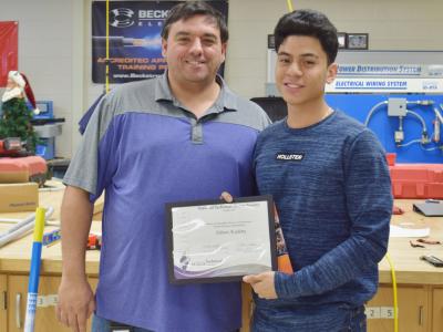 NTHS member from Electrical Construction & Engineering with the instructor, Mr. Wolfe