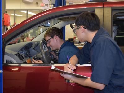 Automotive Technology students working in the auto lab. 