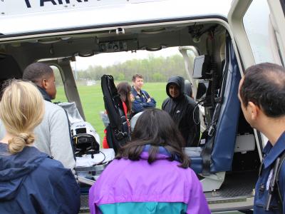 Students take a close look inside the helicopter