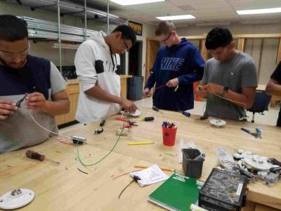 Electrical Students building their first circuits.