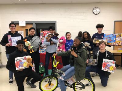 Students posed with toys